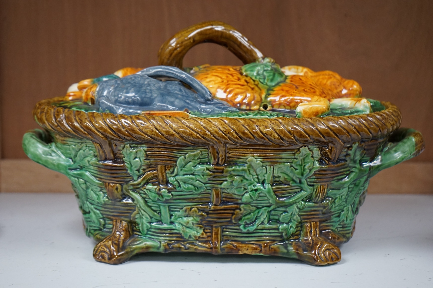 A majolica style game pie dish, 37cm wide